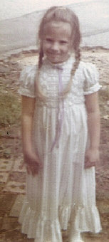 sweet little girl in pigtails