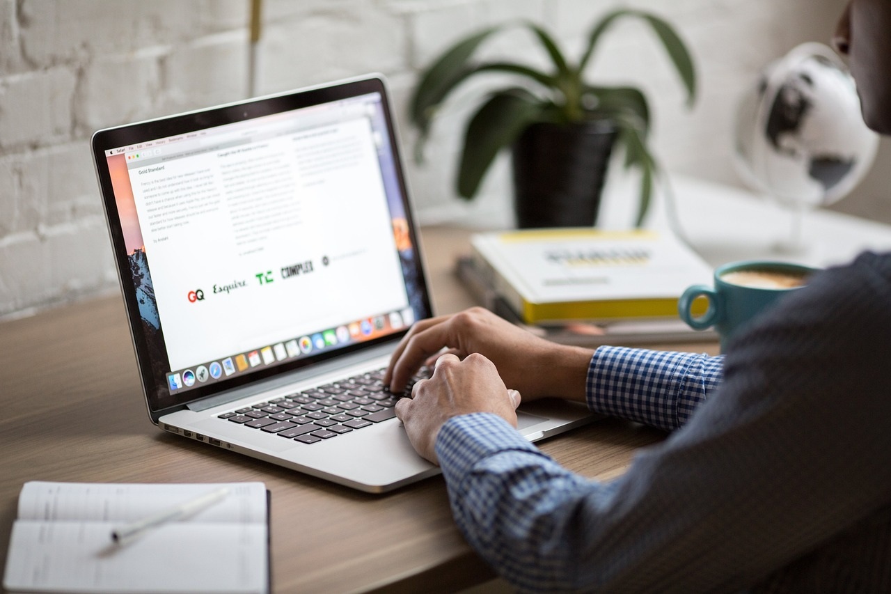 man looking at computer